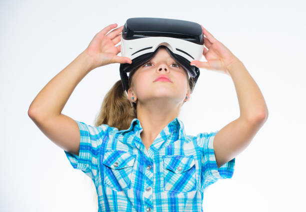 istock Happy kid use modern technology virtual reality. Get virtual experience. Girl cute child with head mounted display on white background. Virtual reality concept. Virtual education for school pupil 1452883029