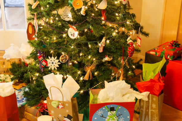 istock Multicolored gifts under the Christmas tree 1452889792