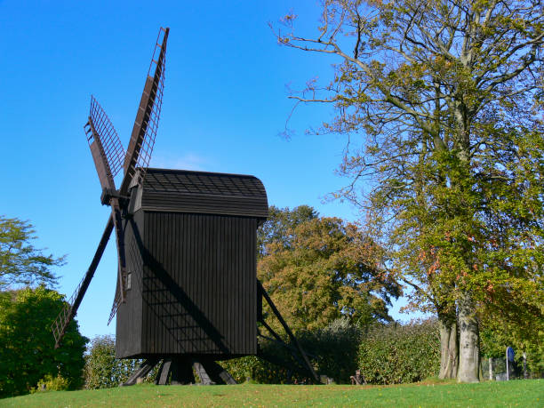 The old wind mill in the open-air museum Den Gamle By stock photo