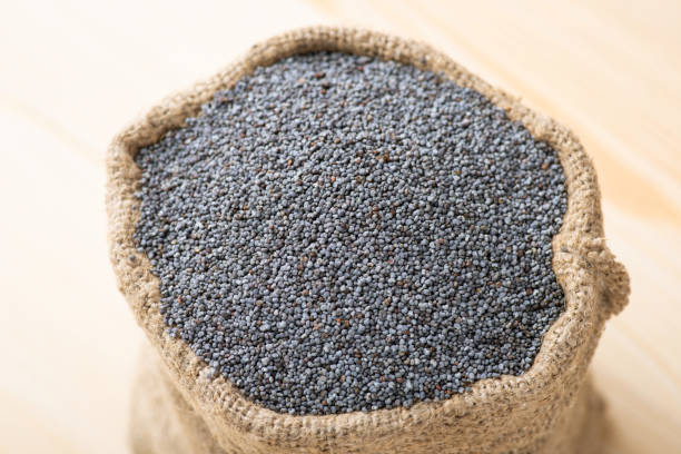 istock Dry fresh poppy seed in a small linen bag 1452893614