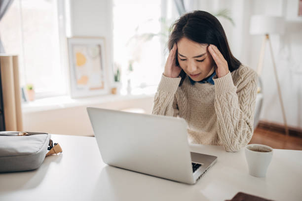 istock Woman has a headache 1452912553