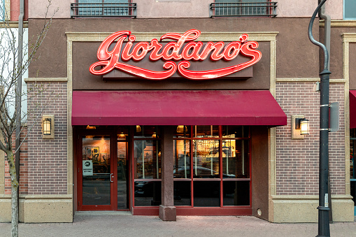 Naperville, IL, USA - April 19, 2019: Giordano's is an Italian restaurant that is known for its Chicago deep dish pizza, mostly in Illinois but also in some other states around the United States.