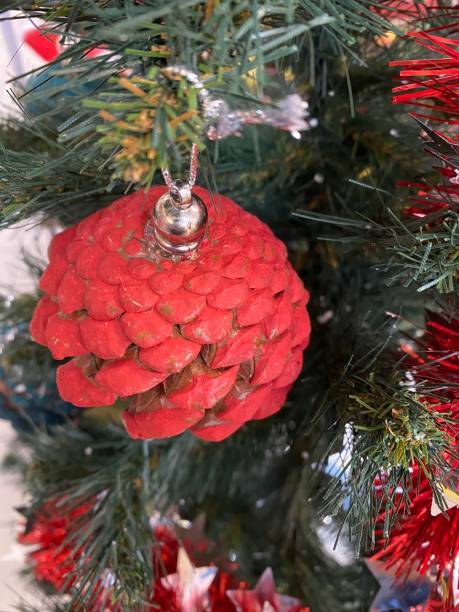 istock Christmas shiny ornaments and pine tree decorations 1452913838