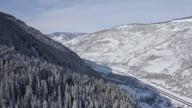 4k Aerial Drone Footage - Beautiful Vail Colorado on a snowy Winter day. Colorado Rocky Mountains