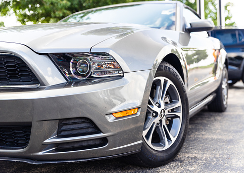 Joliet, IL, USA - July 15, 2018: The 2014 Ford Mustang was made in a coupe or convertible and was fitted with horsepower ranging from 305 to 420 hp.