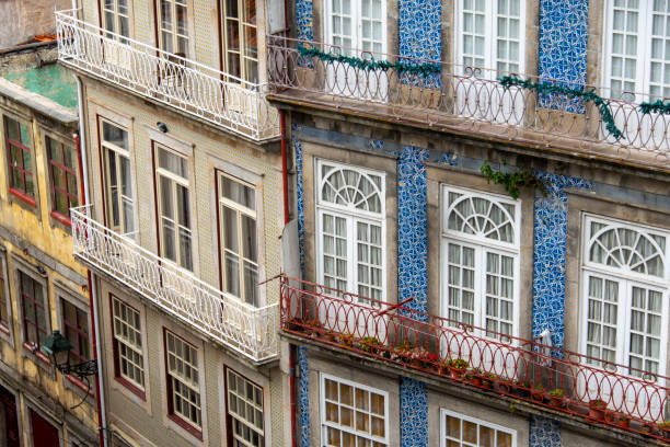 Street view on the old buildings with Portuguese tiles on the facades