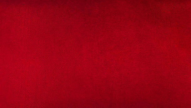 istock red elegance genuine leather texture background for vintage, classic concept. red crimson background for decorations and textures. bright brown color leather skin natural with visible details. 1452928256