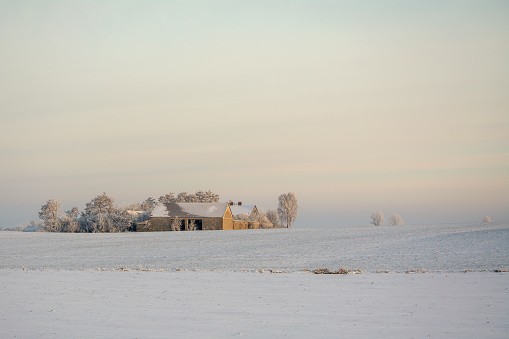 Winter surrounding fields and houses.