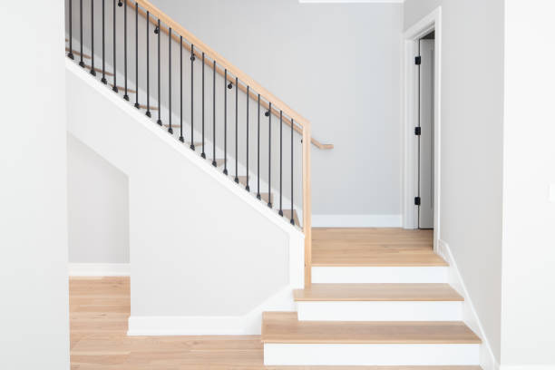 istock A staircase with natural wood and wrought iron spindles. 1452930809