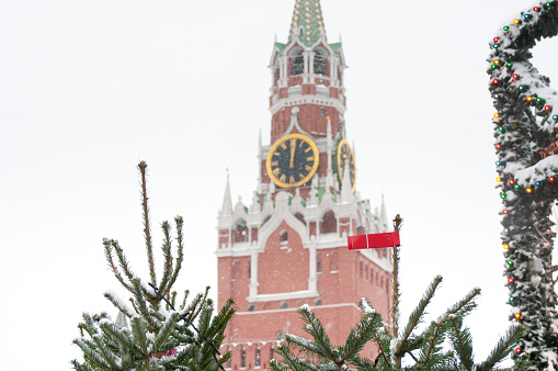 Spasskaya Tower of Moscow Kremlin at Red Square in eve of New Year's and Christmas in Moscow, Russia