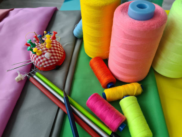 istock Sewing accessories and fabrics and sewing threads and needles 1452932186