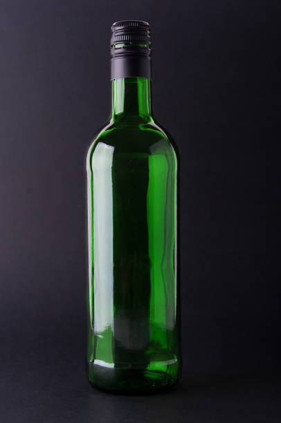 istock Wine bottle close up  on a black background 1452932237