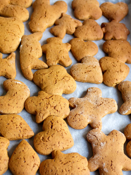 istock Freshly baked cookies on baking sheet 1452935339