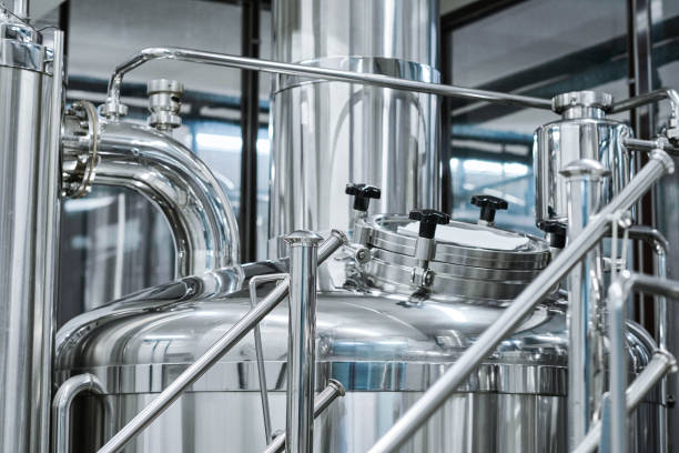 istock Big tank with beer in bottling plant 1452940554