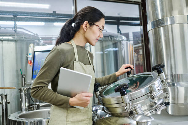 istock Engineer controlling the equipment at factory 1452940907
