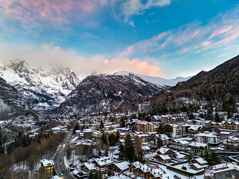 Aerial view of Courmayeur with snow from drone, Italian Alps in Valle d'Aosta