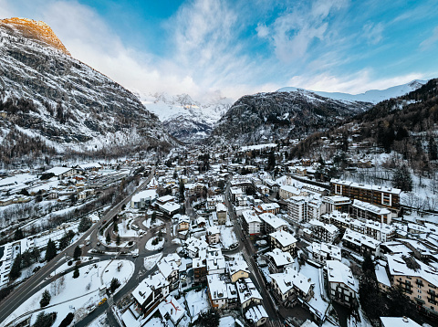 Aerial view of Courmayeur with snow from drone, Italian Alps in Valle d'Aosta
