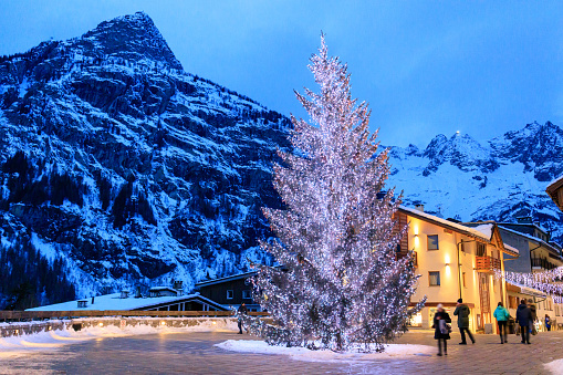 Courmayeur main square at Christmas time with Christmas tree