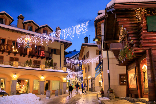 Courmayeur at dusk With Christmas decorations and mountain background