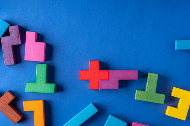 istock Top view on colorful wooden blocks folding on blue background 1452953652