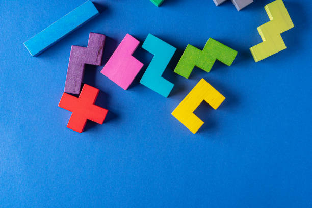 istock Top view on colorful wooden blocks folding on blue background 1452953661