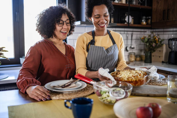 istock Lesbian couple in love. Lunch time. 1452961902