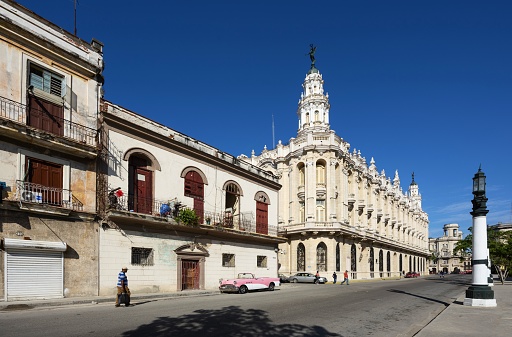 Havana, Cuba, November 21, 2017: View of the San José Street in the center of Havana. The ornate building with the tower is the museum Centro Gallego.