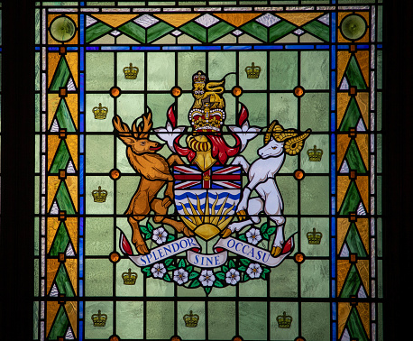 Stained glass window of the British Colombia coat of arms in Victoria