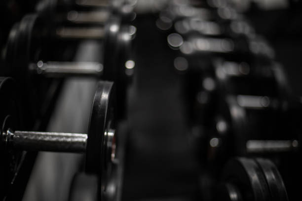 Gym dumbbells in a rack at the gym