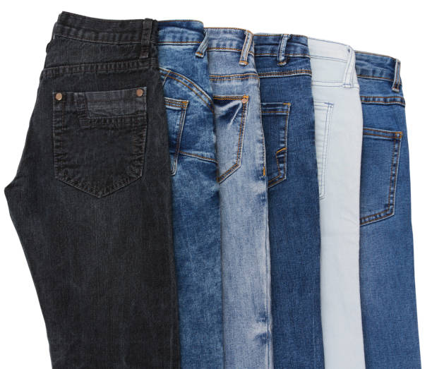 istock a set of multi-colored jeans on a white background close-up 1452982463