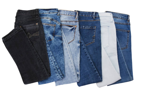 istock a set of multi-colored jeans on a white background close-up 1452982468