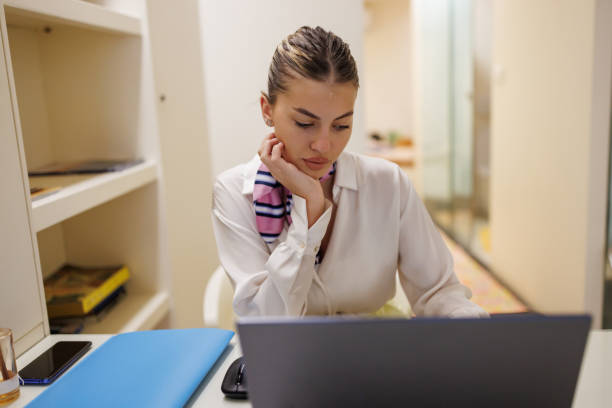 istock Young businesswoman at work place 1452988045
