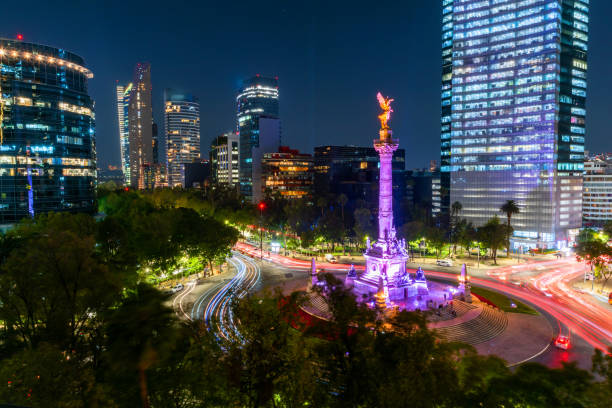 View of Paseo de Reforma in Mexico City, financial district at night View of Paseo de Reforma in Mexico City, financial district at night mexico city stock pictures, royalty-free photos & images