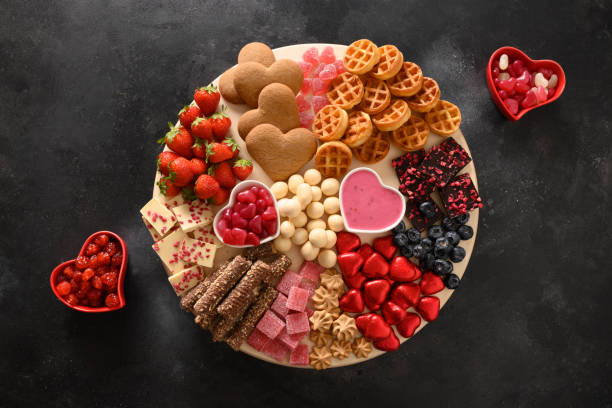 istock Charcuterie Valentines Day board with chocolate sweets. 1452995305