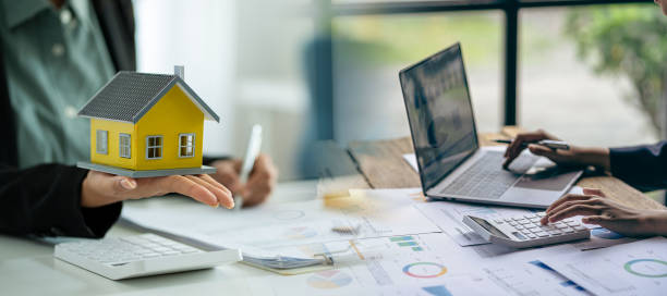 istock Real Estate Broker Business Business working with startup projects Analysis plan for presenting financial ideas in bank loan 1452999733