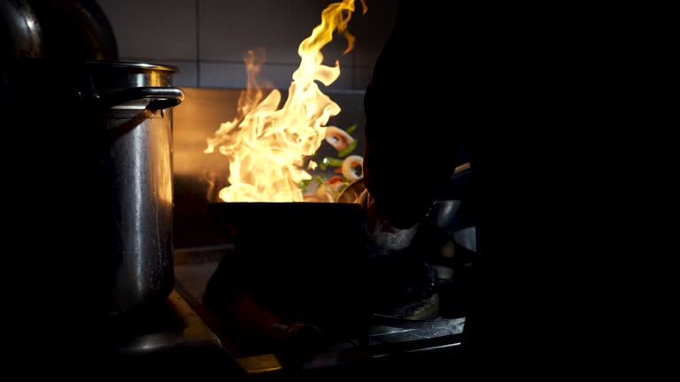 Cooking in Fiery Wok Asian Cuisine Slow-Mo 4k