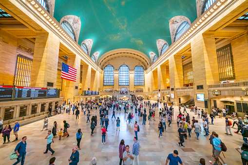Manhattan, New York City, USA - December 25, 2019: Grand Central Terminal main hall full of tourists and commuters ready to catch a train on Christmas day