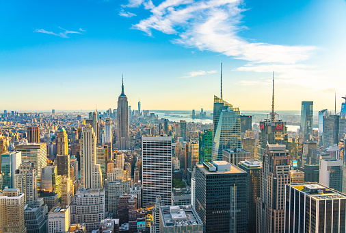 United States, New York City - September 16, 2019: Panoramic view of The Empire State Building, Manhattan downtown and skyscrapers at sunset.