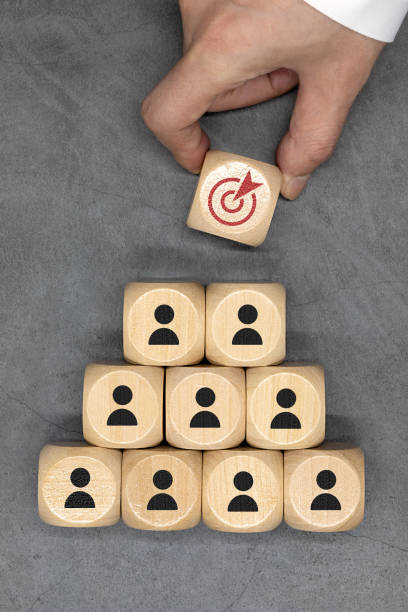 istock work together with one's team members toward one's goal 1453005534