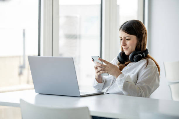 istock Young woman takes a break at the office 1453019838