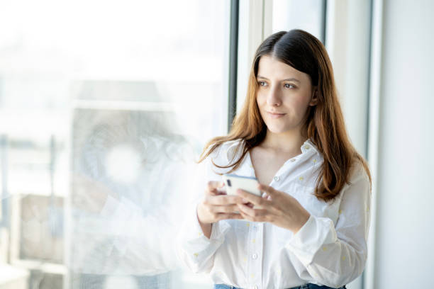 istock Young woman takes a break at the office 1453019869