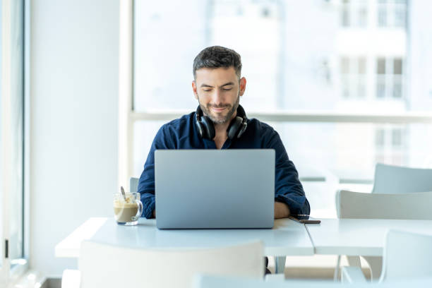 A young man takes a break at the office