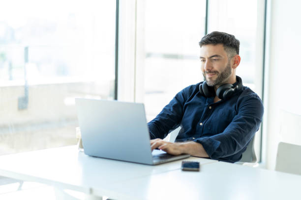 istock A young man takes a break at the office 1453022945