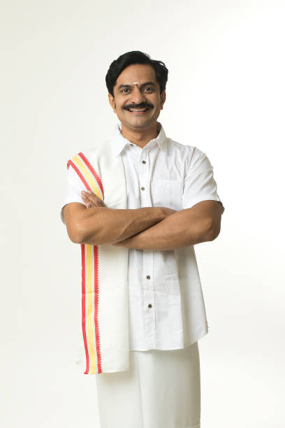 istock Happy south Indian man with arms crossed 1453024795