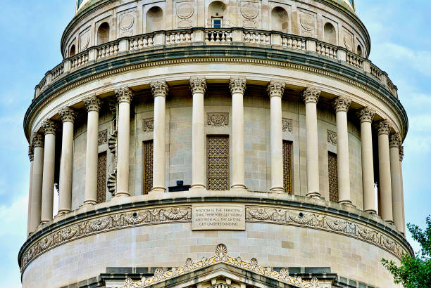 Charleston, West Virginia, USA - July 24, 2018: Close-up view of the columns surrounding the West Virginia Capitol Building Dome showing intricate artwork and architecture.