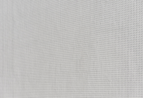 Close-up of white mosaic tiles texture background.