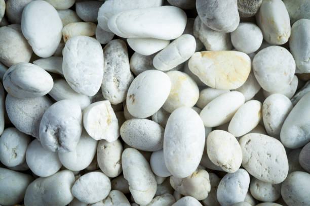 istock Black and white stones designed in to shapes 1453029655