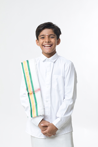 Happy south indian boy in traditional clothing