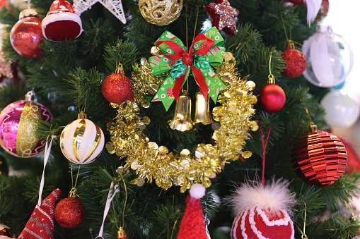 Christmas corner decoration with pine twigs and balls isolated on white background