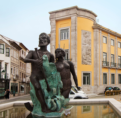 Viana do Castelo, Portugal-May 5, 2011: Bronze statue of the local maritime adventurer Diogo Alvares Correia known as Caramuru, by the sculptor José Rodrigues. Republic Square, Viana do Castelo, Portugal.